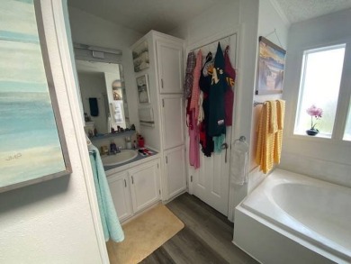 Discover this stunning triple-wide manufactured home in on Schalamar Creek Golf and Country Club in Florida - for sale on GolfHomes.com, golf home, golf lot