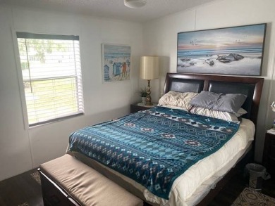 Discover this stunning triple-wide manufactured home in on Schalamar Creek Golf and Country Club in Florida - for sale on GolfHomes.com, golf home, golf lot