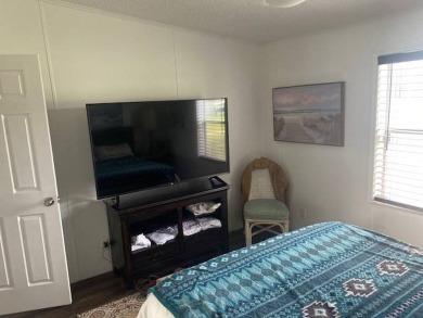 Discover this stunning triple-wide manufactured home in on Schalamar Creek Golf and Country Club in Florida - for sale on GolfHomes.com, golf home, golf lot