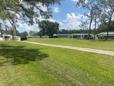 Discover this stunning triple-wide manufactured home in on Schalamar Creek Golf and Country Club in Florida - for sale on GolfHomes.com, golf home, golf lot