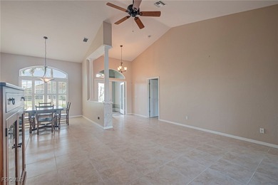 This very well-maintained 3-bedroom, 2-bathroom home is situated on Royal Tee Country Club in Florida - for sale on GolfHomes.com, golf home, golf lot