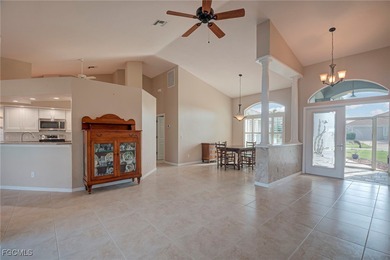 This very well-maintained 3-bedroom, 2-bathroom home is situated on Royal Tee Country Club in Florida - for sale on GolfHomes.com, golf home, golf lot