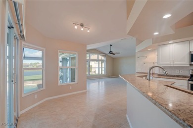 This very well-maintained 3-bedroom, 2-bathroom home is situated on Royal Tee Country Club in Florida - for sale on GolfHomes.com, golf home, golf lot