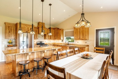 This spacious and well-appointed home located in The Powder Horn on The Powder Horn Golf Club - Mountain in Wyoming - for sale on GolfHomes.com, golf home, golf lot