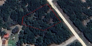 Great building site with mature shade trees, .62 of an acre on Nocona Hills Golf Course in Texas - for sale on GolfHomes.com, golf home, golf lot