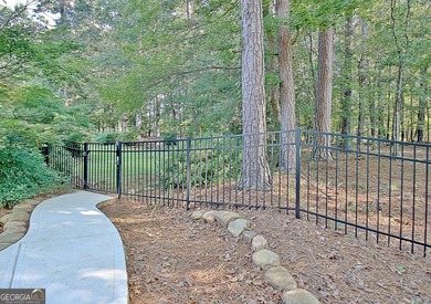 A SWEETHEART of a DEAL! You will not want to miss this home, it on Whitewater Creek in Georgia - for sale on GolfHomes.com, golf home, golf lot