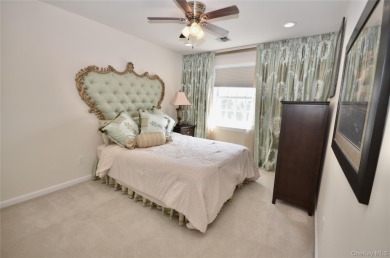 Immaculate Medici Model 2-bedroom, 2.5-bath (Primary on the on The Greens At Half Hollow in New York - for sale on GolfHomes.com, golf home, golf lot