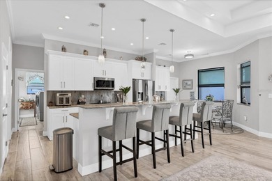 WATERFRONT POOL HOME WITH GULF ACCESS in South Gulf Cove! on Rotonda Golf and Country Club - Long Marsh  in Florida - for sale on GolfHomes.com, golf home, golf lot