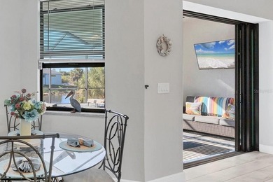 WATERFRONT POOL HOME WITH GULF ACCESS in South Gulf Cove! on Rotonda Golf and Country Club - Long Marsh  in Florida - for sale on GolfHomes.com, golf home, golf lot