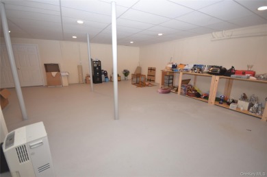 Immaculate Medici Model 2-bedroom, 2.5-bath (Primary on the on The Greens At Half Hollow in New York - for sale on GolfHomes.com, golf home, golf lot