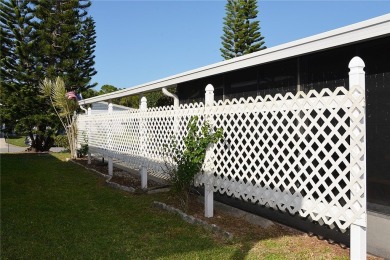 Spacious, well-maintained home with wide open floor plan. Lovely on Barefoot Bay Golf Course in Florida - for sale on GolfHomes.com, golf home, golf lot