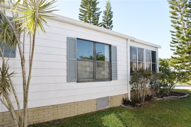 Spacious, well-maintained home with wide open floor plan. Lovely on Barefoot Bay Golf Course in Florida - for sale on GolfHomes.com, golf home, golf lot