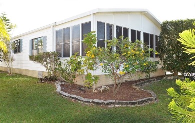 Spacious, well-maintained home with wide open floor plan. Lovely on Barefoot Bay Golf Course in Florida - for sale on GolfHomes.com, golf home, golf lot