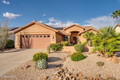 Welcome to this expanded and meticulously maintained furnished on Quail Creek Country Club  in Arizona - for sale on GolfHomes.com, golf home, golf lot