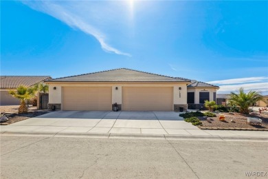 Welcome to this stunning 3-bedroom, 2-bath home nestled in the on Desert Lakes Golf Course in Arizona - for sale on GolfHomes.com, golf home, golf lot