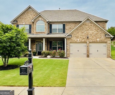 This home has it all! Situated on a beautifully landscaped level on Chateau Elan Golf Club  in Georgia - for sale on GolfHomes.com, golf home, golf lot