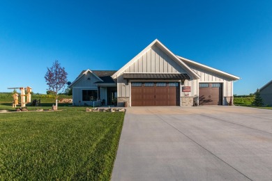 This beautifully finished 3-bedroom, 2.5-bath home in The Powder on The Powder Horn Golf Club - Mountain in Wyoming - for sale on GolfHomes.com, golf home, golf lot