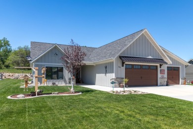This beautifully finished 3-bedroom, 2.5-bath home in The Powder on The Powder Horn Golf Club - Mountain in Wyoming - for sale on GolfHomes.com, golf home, golf lot