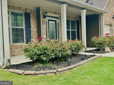 This home has it all! Situated on a beautifully landscaped level on Chateau Elan Golf Club  in Georgia - for sale on GolfHomes.com, golf home, golf lot
