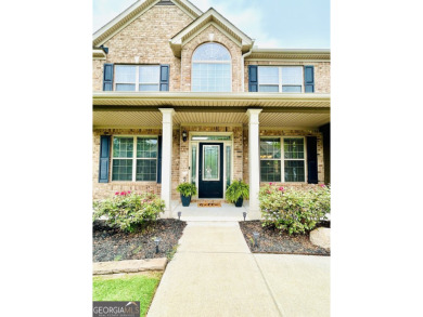 This home has it all! Situated on a beautifully landscaped level on Chateau Elan Golf Club  in Georgia - for sale on GolfHomes.com, golf home, golf lot