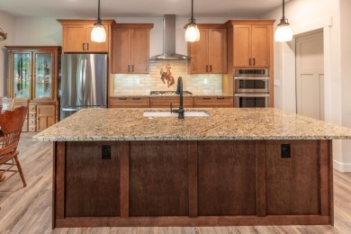 This beautifully finished 3-bedroom, 2.5-bath home in The Powder on The Powder Horn Golf Club - Mountain in Wyoming - for sale on GolfHomes.com, golf home, golf lot