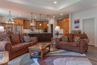 This beautifully finished 3-bedroom, 2.5-bath home in The Powder on The Powder Horn Golf Club - Mountain in Wyoming - for sale on GolfHomes.com, golf home, golf lot