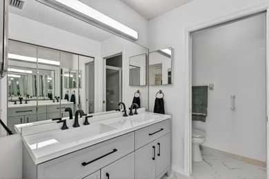 Enjoy stunning lake and golf course views right from your living on Heritage Ridge Golf Club in Florida - for sale on GolfHomes.com, golf home, golf lot