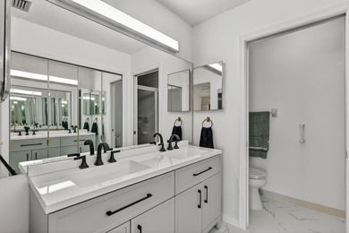 Enjoy stunning lake and golf course views right from your living on Heritage Ridge Golf Club in Florida - for sale on GolfHomes.com, golf home, golf lot