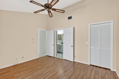 Enjoy stunning lake and golf course views right from your living on Heritage Ridge Golf Club in Florida - for sale on GolfHomes.com, golf home, golf lot