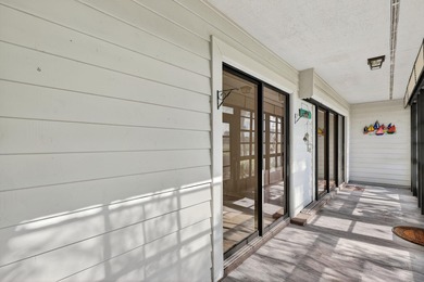 Enjoy stunning lake and golf course views right from your living on Heritage Ridge Golf Club in Florida - for sale on GolfHomes.com, golf home, golf lot