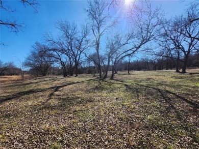 Just under an acre building site lot with mature oak trees  to on Nocona Hills Golf Course in Texas - for sale on GolfHomes.com, golf home, golf lot