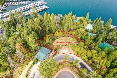 Discover this exceptional pie-shaped lot offering breathtaking on Hayden Lake Country Club in Idaho - for sale on GolfHomes.com, golf home, golf lot