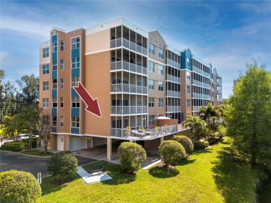Discover luxury living in this stunning corner condo featuring on East Bay Golf Club in Florida - for sale on GolfHomes.com, golf home, golf lot