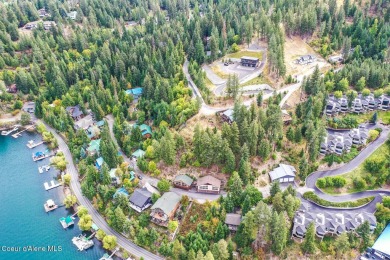 Discover this exceptional pie-shaped lot offering breathtaking on Hayden Lake Country Club in Idaho - for sale on GolfHomes.com, golf home, golf lot