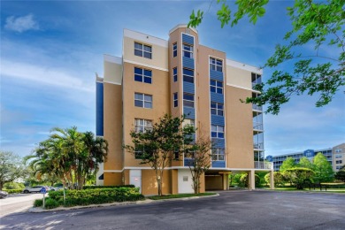 Discover luxury living in this stunning corner condo featuring on East Bay Golf Club in Florida - for sale on GolfHomes.com, golf home, golf lot