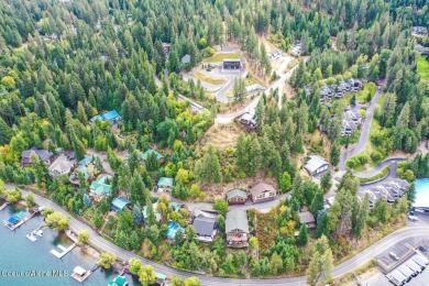 Discover this exceptional pie-shaped lot offering breathtaking on Hayden Lake Country Club in Idaho - for sale on GolfHomes.com, golf home, golf lot