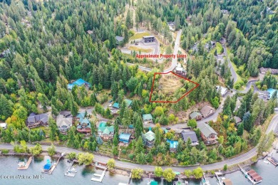 Discover this exceptional pie-shaped lot offering breathtaking on Hayden Lake Country Club in Idaho - for sale on GolfHomes.com, golf home, golf lot