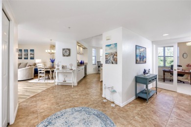 Discover luxury living in this stunning corner condo featuring on East Bay Golf Club in Florida - for sale on GolfHomes.com, golf home, golf lot