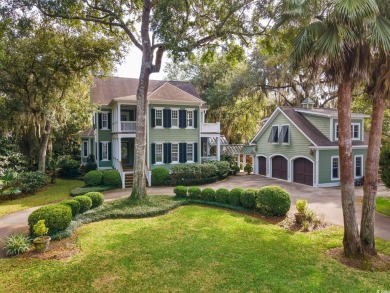 The pond view is breathtaking! This Low Country 5 bedroom, 5 on DeBordieu Country Club in South Carolina - for sale on GolfHomes.com, golf home, golf lot