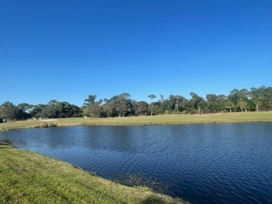 Beautiful Ballantrae home on very private large corner lot at on Santa Lucia River Club in Florida - for sale on GolfHomes.com, golf home, golf lot