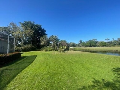 Beautiful Ballantrae home on very private large corner lot at on Santa Lucia River Club in Florida - for sale on GolfHomes.com, golf home, golf lot