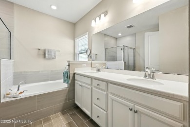 This immaculate home built in 2021 is MOVE IN READY and offers on Golf Club At South Hampton in Florida - for sale on GolfHomes.com, golf home, golf lot