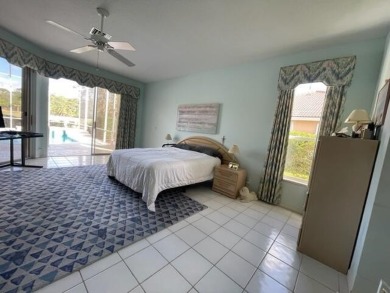 Beautiful Ballantrae home on very private large corner lot at on Santa Lucia River Club in Florida - for sale on GolfHomes.com, golf home, golf lot