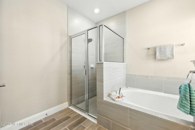 This immaculate home built in 2021 is MOVE IN READY and offers on Golf Club At South Hampton in Florida - for sale on GolfHomes.com, golf home, golf lot
