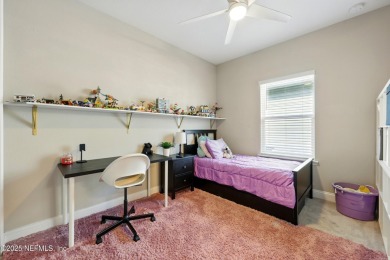 This immaculate home built in 2021 is MOVE IN READY and offers on Golf Club At South Hampton in Florida - for sale on GolfHomes.com, golf home, golf lot