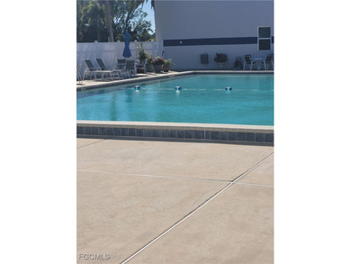 Welcome to Your Dream Home! Embrace the serene allure of this on Myerlee Country Club in Florida - for sale on GolfHomes.com, golf home, golf lot