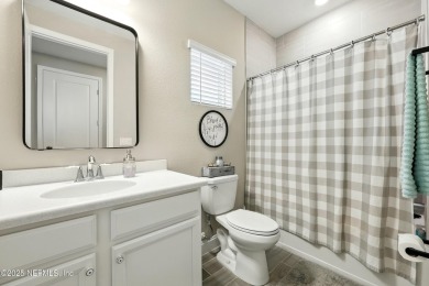 This immaculate home built in 2021 is MOVE IN READY and offers on Golf Club At South Hampton in Florida - for sale on GolfHomes.com, golf home, golf lot