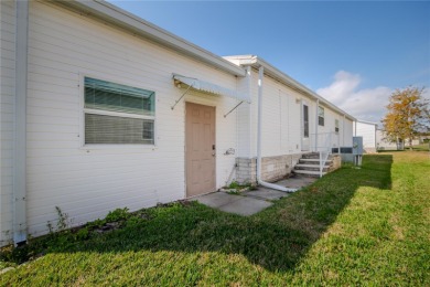 Spacious and move-in ready, this beautifully updated 3-bedroom on Zellwood Station Country Club in Florida - for sale on GolfHomes.com, golf home, golf lot