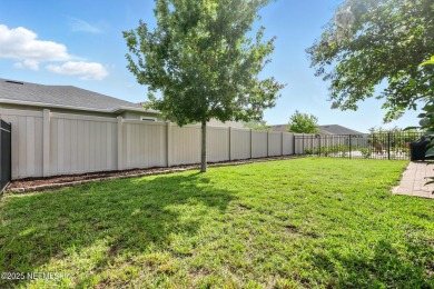 This immaculate home built in 2021 is MOVE IN READY and offers on Golf Club At South Hampton in Florida - for sale on GolfHomes.com, golf home, golf lot