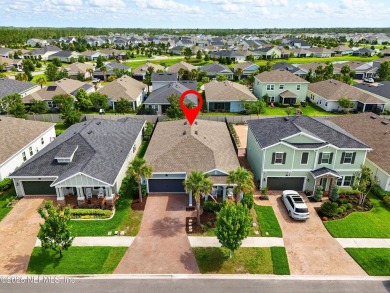 This immaculate home built in 2021 is MOVE IN READY and offers on Golf Club At South Hampton in Florida - for sale on GolfHomes.com, golf home, golf lot